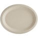 A white World Centric oval plate with a round edge.