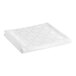 A folded white top sheet with a chain link pattern.