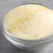 A bowl of white and yellow powder.