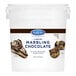 A white bucket of Satin Ice Liquid Marbling Chocolate.