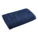 A navy blue 1888 Mills bath towel on a white background.