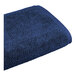 A navy blue 1888 Mills bath towel.