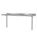 A stainless steel table mounted shelf from Advance Tabco over a table.