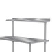 A stainless steel Advance Tabco rear mount shelf with two shelves on a table.