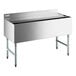 A Regency stainless steel underbar ice bin with sliding lid on a counter.