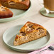 A slice of whole wheat banana bread cake on a plate.
