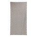 A 1888 Mills tan pool towel with a diamond pattern in white.