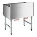 A stainless steel Regency underbar ice bin with red tubes and sliding lid.