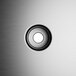 The sliding lid button for a Regency underbar ice bin with a black circle in the middle.