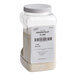 A plastic container of True Citrus Crystallized Grapefruit Powder with a label and a barcode.