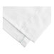 A close-up of a white cloth with green stitching.