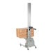 A Vestil Quick Lift machine with a box on it.