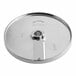 A round metal slicing disc designed for use with the AvaMix Revolution Max Series food processors.