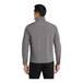 A man wearing a Port Authority Core Soft Shell jacket in deep smoke grey.
