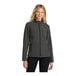 A woman wearing a black and charcoal grey Port Authority soft shell jacket.
