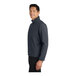 A close-up of a Port Authority Battleship Gray Core Soft Shell Jacket.