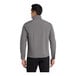A man wearing a Port Authority Core Soft Shell jacket in deep smoke grey.