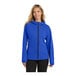 A woman wearing a blue Port Authority rain jacket with a zipper.