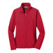 A red Port Authority ladies soft shell jacket with zippers.
