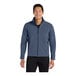 A man wearing a navy blue Port Authority Core Soft Shell Jacket with a full-zip closure.