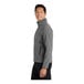 A man wearing a Port Authority Core Soft Shell Jacket in pearl gray heather.