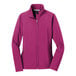 A pink Port Authority soft shell jacket with a zipper.