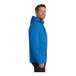 A close-up of a blue Port Authority parka jacket.