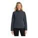 A woman wearing a Port Authority Core Soft Shell jacket in battleship gray.