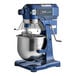 A blue and silver Waring Luna stand mixer with a stainless steel bowl.