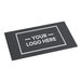 A rectangular black entrance mat with a customizable area for a logo, designed for indoor or outdoor use.