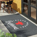 A large rectangular customizable anti-fatigue entrance mat with a steakhouse logo, suitable for indoor or outdoor use.