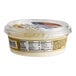 A container of John F. Martin plain whipped cream cheese spread with a label.