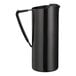 A tall, slim black stainless steel pitcher with a handle and spout.