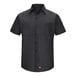 A Red Kap black short sleeve work shirt with MIMIX flex panels and buttons.