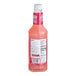 A bottle of Master of Mixes Paloma Mix, a pink liquid.
