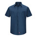 A Red Kap navy short sleeved work shirt with buttons and MIMIX flex panels.