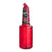 A close up of a Finest Call Premium Rose Syrup bottle with a red cap.