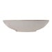 A dusty blue stoneware deep coupe plate with a brown border.