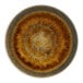 A close-up of a brown Cosy & Trendy Iris porcelain coupe plate with a circular design.