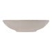 A terracotta stoneware deep coupe plate with a rim on a white background.