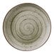 A close up of a Cosy & Trendy stoneware coupe plate with green ivy swirls.