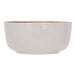 A white Cosy & Trendy stoneware bowl with gold rim.