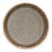 A close up of a green Cosy & Trendy Melia porcelain raised plate.