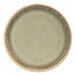 A close up of a green Cosy & Trendy Melia porcelain raised plate.