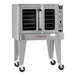 A Southbend Platinum Series electric convection oven with wheels and a door.