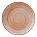 A close-up of a brown terracotta Cosy & Trendy Sintra stoneware plate with a spiral design.