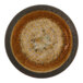A close up of a brown Cosy & Trendy Iris porcelain coupe plate with a brown rim.