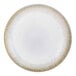 A white plate with a blue and yellow border and gold stripes on the border.