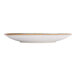 A white porcelain coupe plate with blue stripes on the rim.