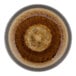 A brown porcelain Cosy & Trendy Iris coupe plate with a brown and tan pattern.